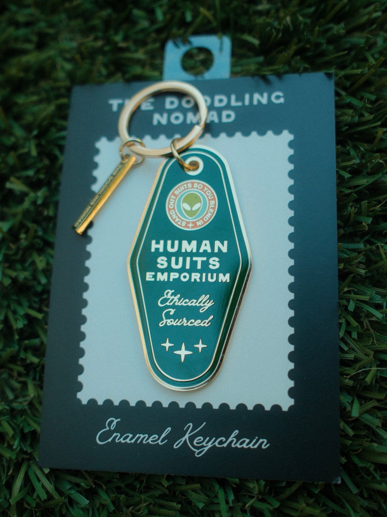 Human Suits Emporium Enamel Keychain